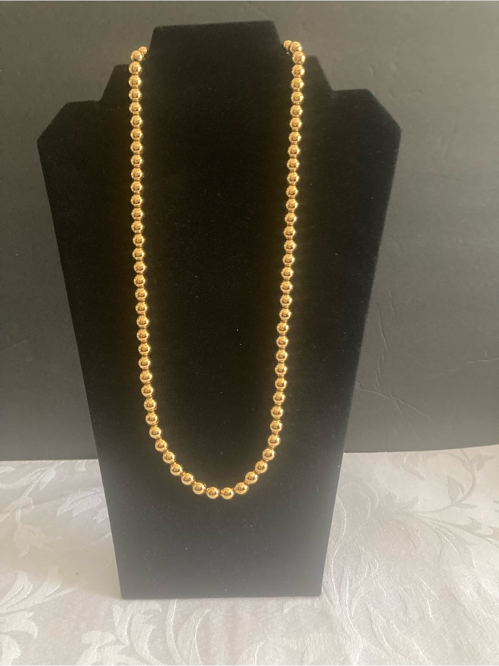 Signed Monet Gold Metal Bead Necklace.